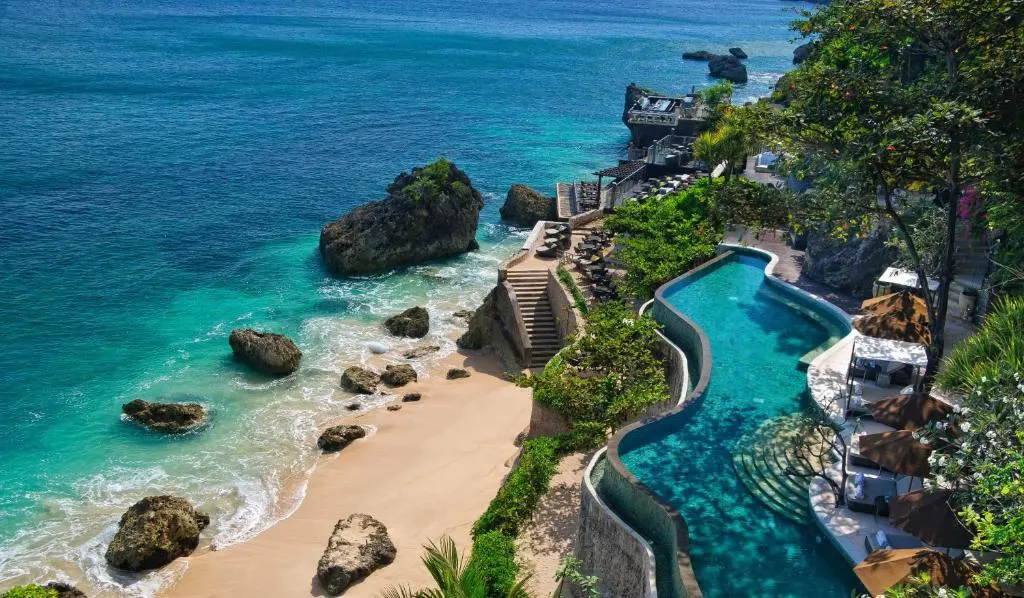Aerial view of AYANA Resort with oceanfront pool and private beach in Bali