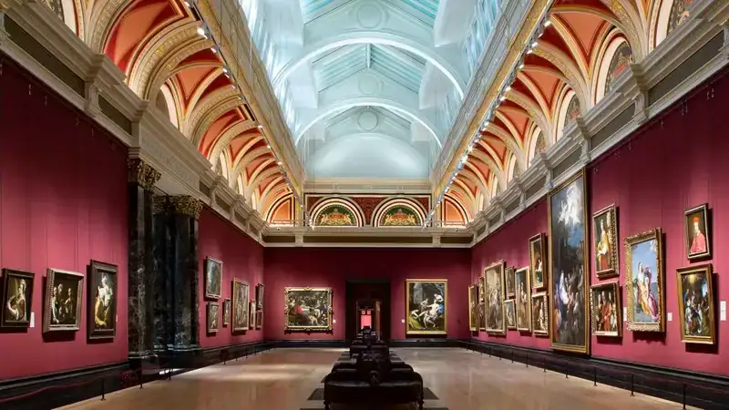 Interior of The National Gallery with classical paintings and ornate ceiling