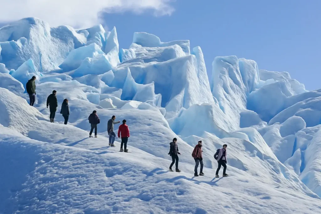 Tourists hiking on Perito Moreno Glacier in Patagonia, Argentina.