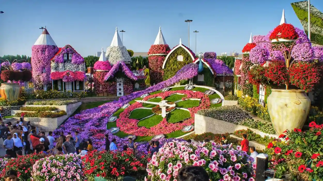 Vibrant flower structures and butterfly domes at Dubai Butterfly Garden