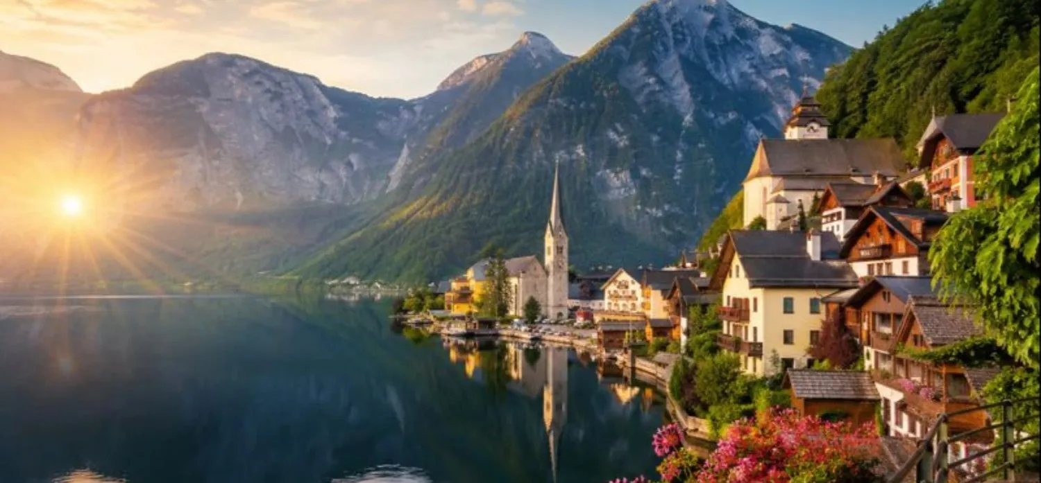 Beautiful alpine village by a lake in Europe with mountains and scenic landscape